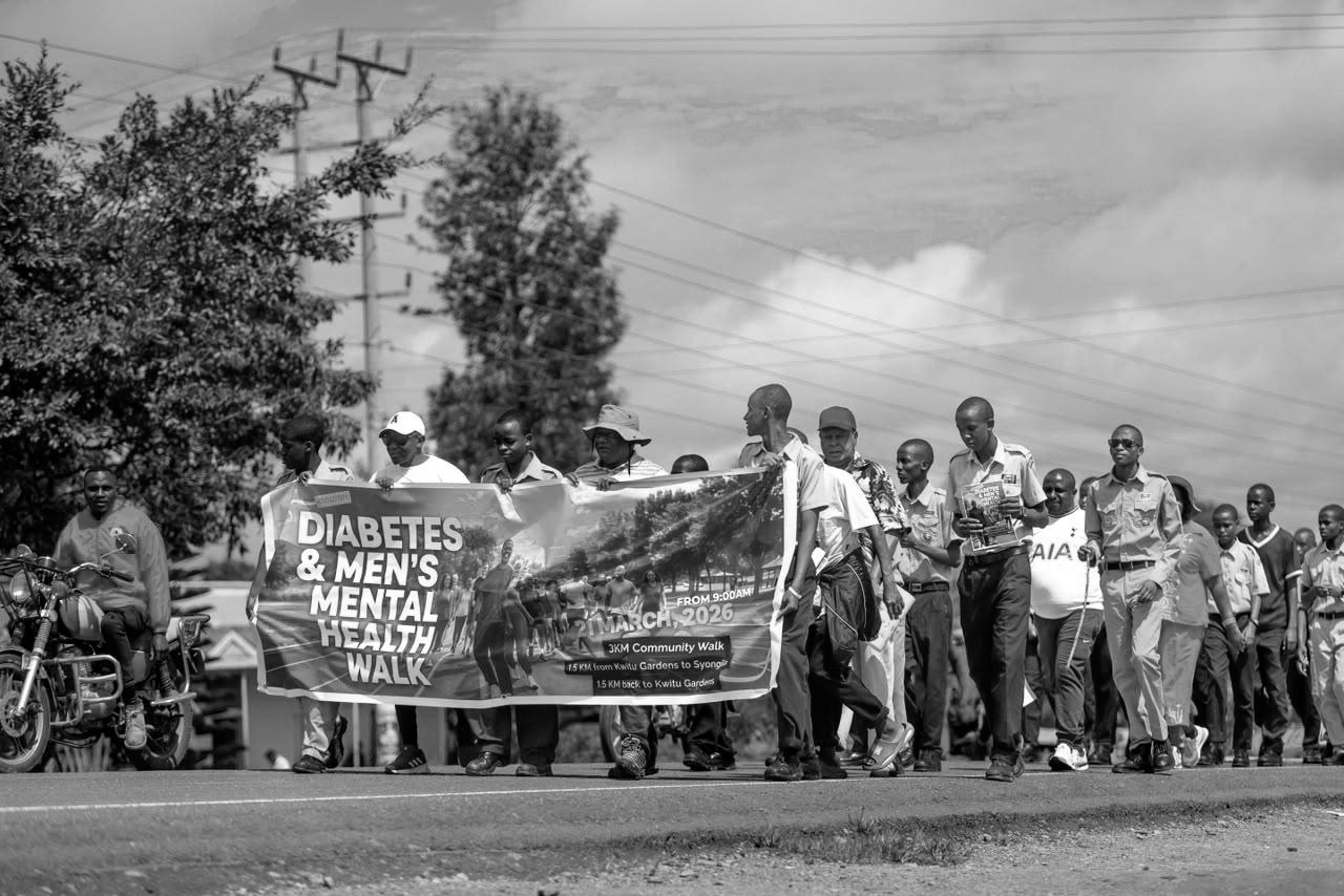 Community members walking together for diabetes and men’s mental health awareness